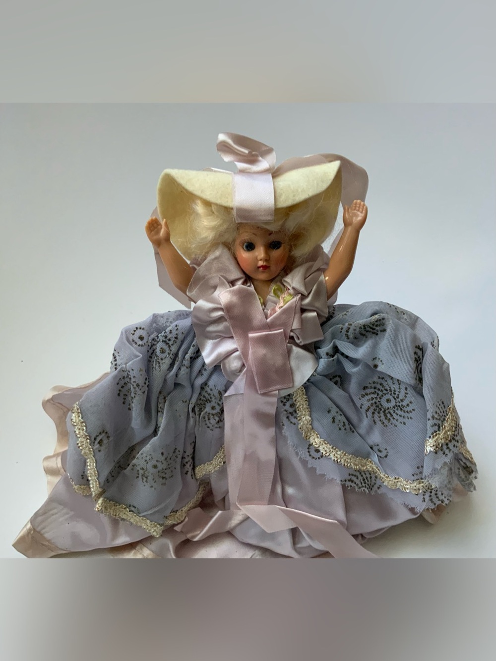 Vintage Celluloid Doll with Decorative Dress